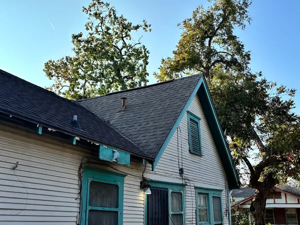 a backyard of a house with lots of green space