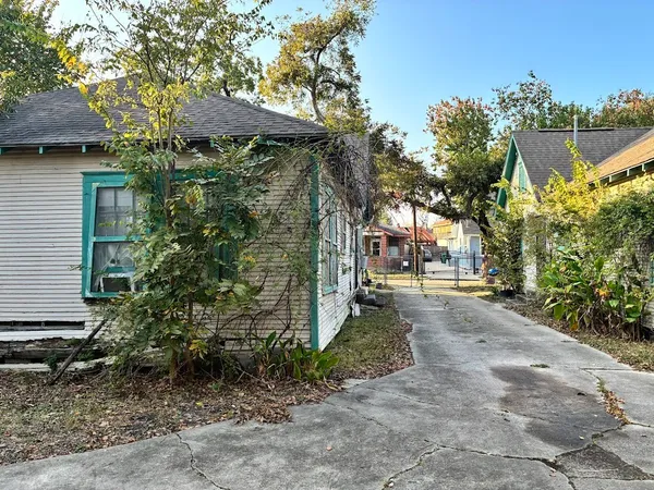 a backyard of a house with seating space