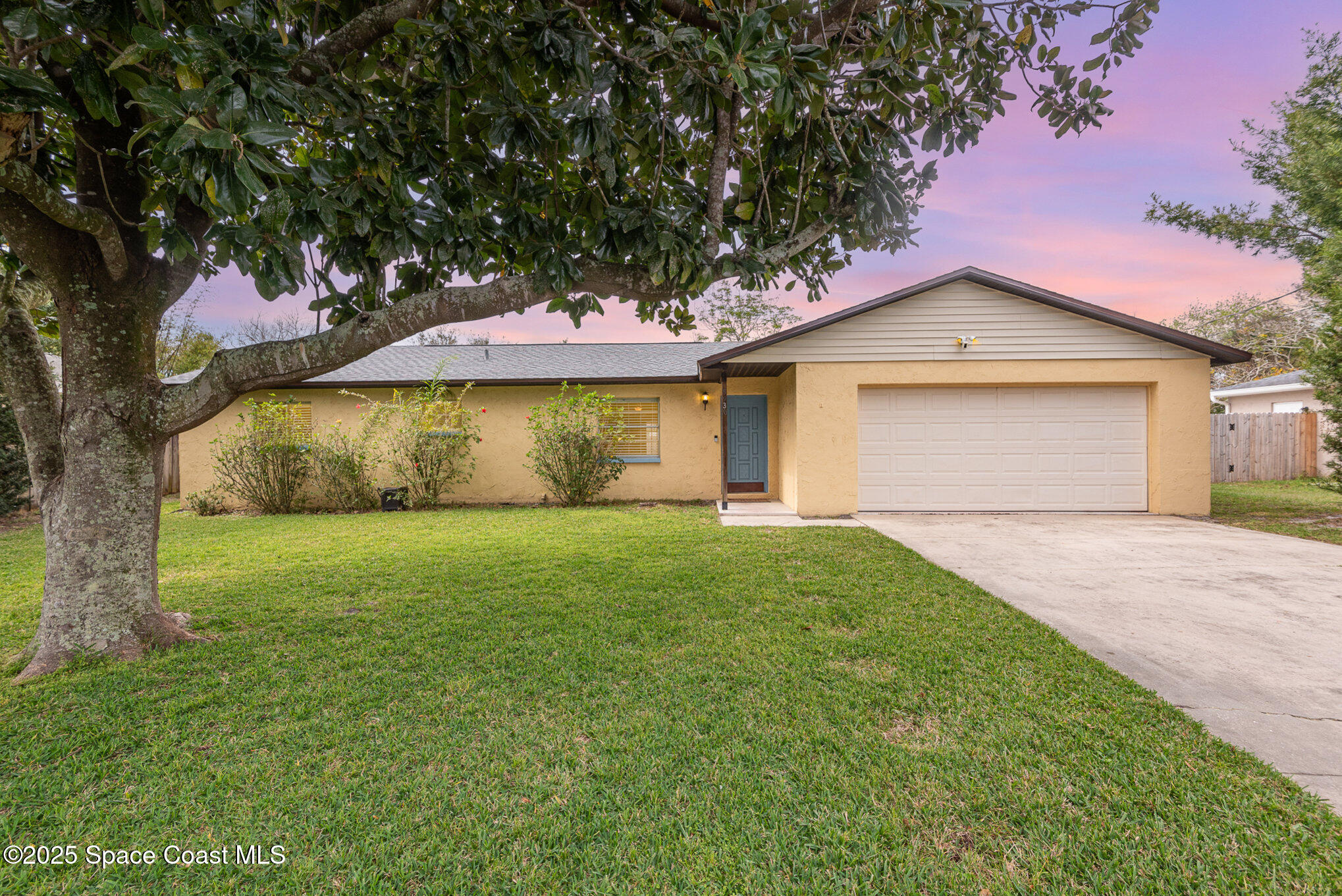 5930 Ackard Avenue Cocoa, FL 32927 - Photo 1 of 22 a front view of a house with a garden