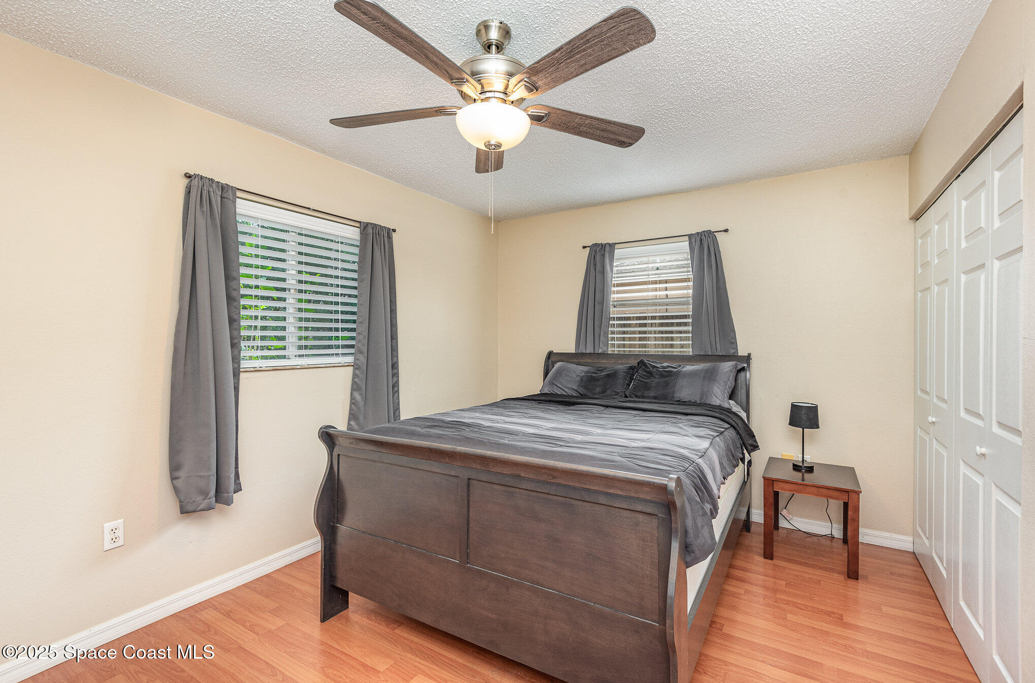 5930 Ackard Avenue Cocoa, FL 32927 - Photo 12 of 22 a bedroom with a bed and a window