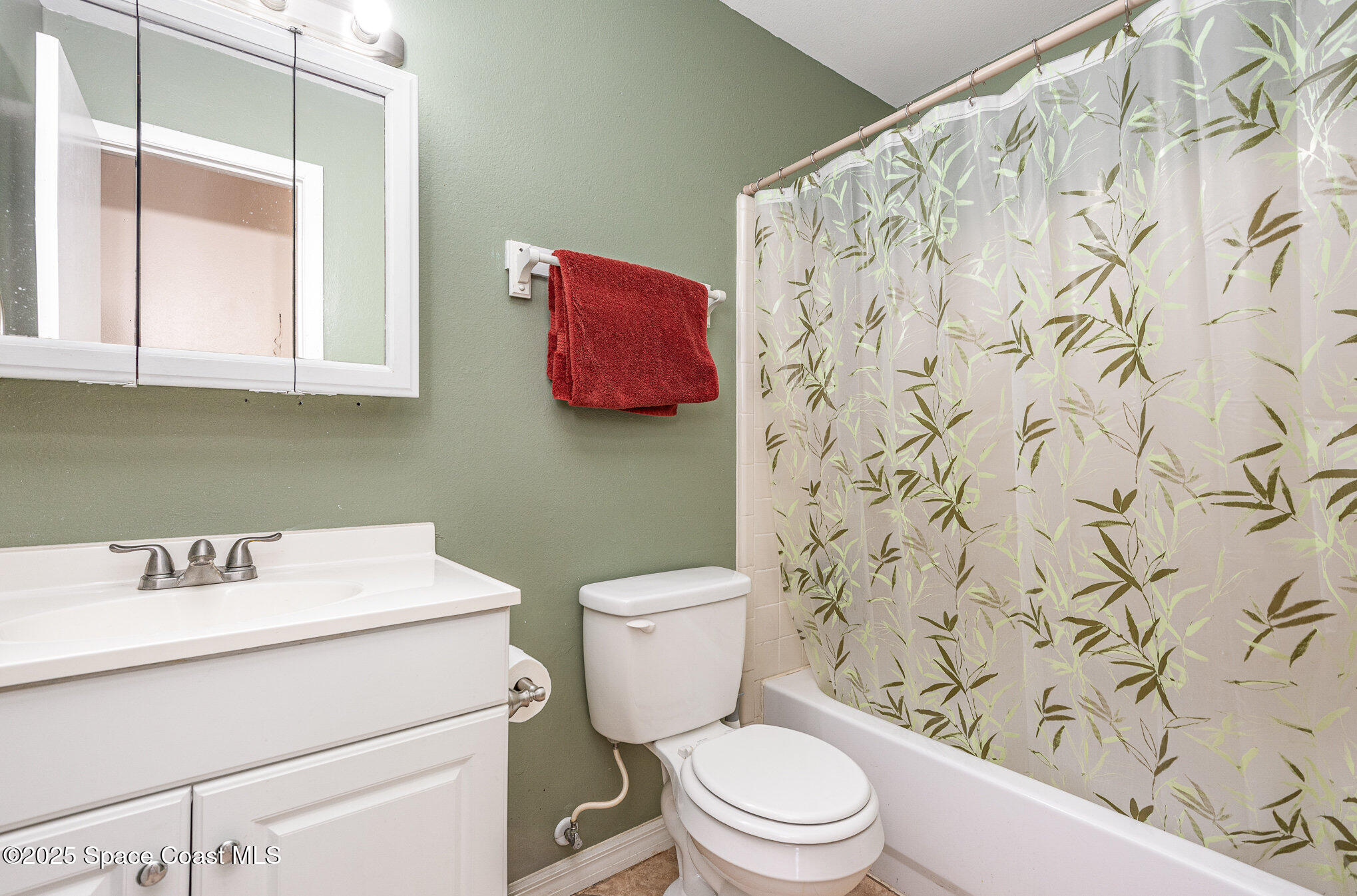 5930 Ackard Avenue Cocoa, FL 32927 - Photo 13 of 22 a bathroom with a toilet and a sink