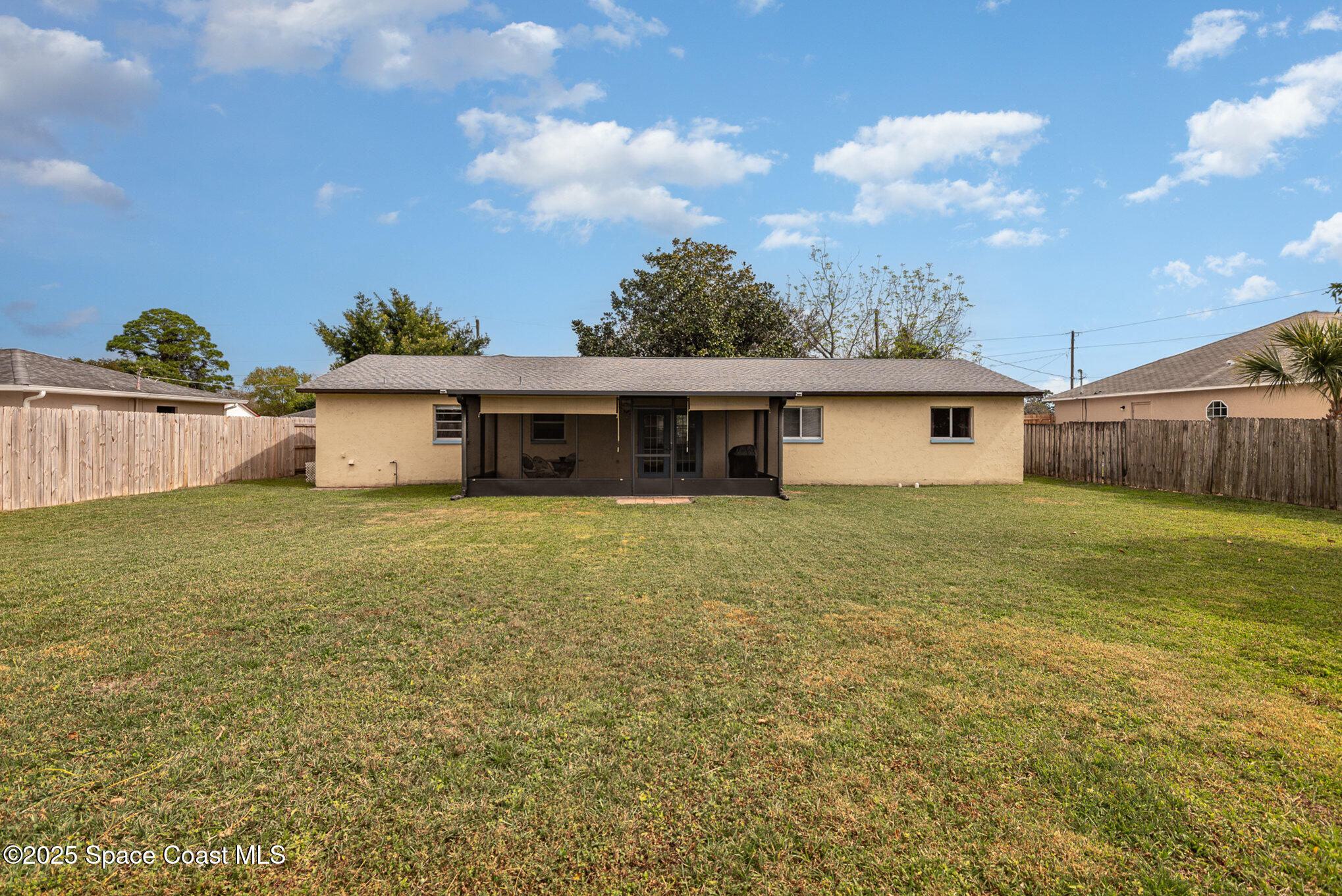 5930 Ackard Avenue Cocoa, FL 32927 - Photo 20 of 22 a front view of a house with garden