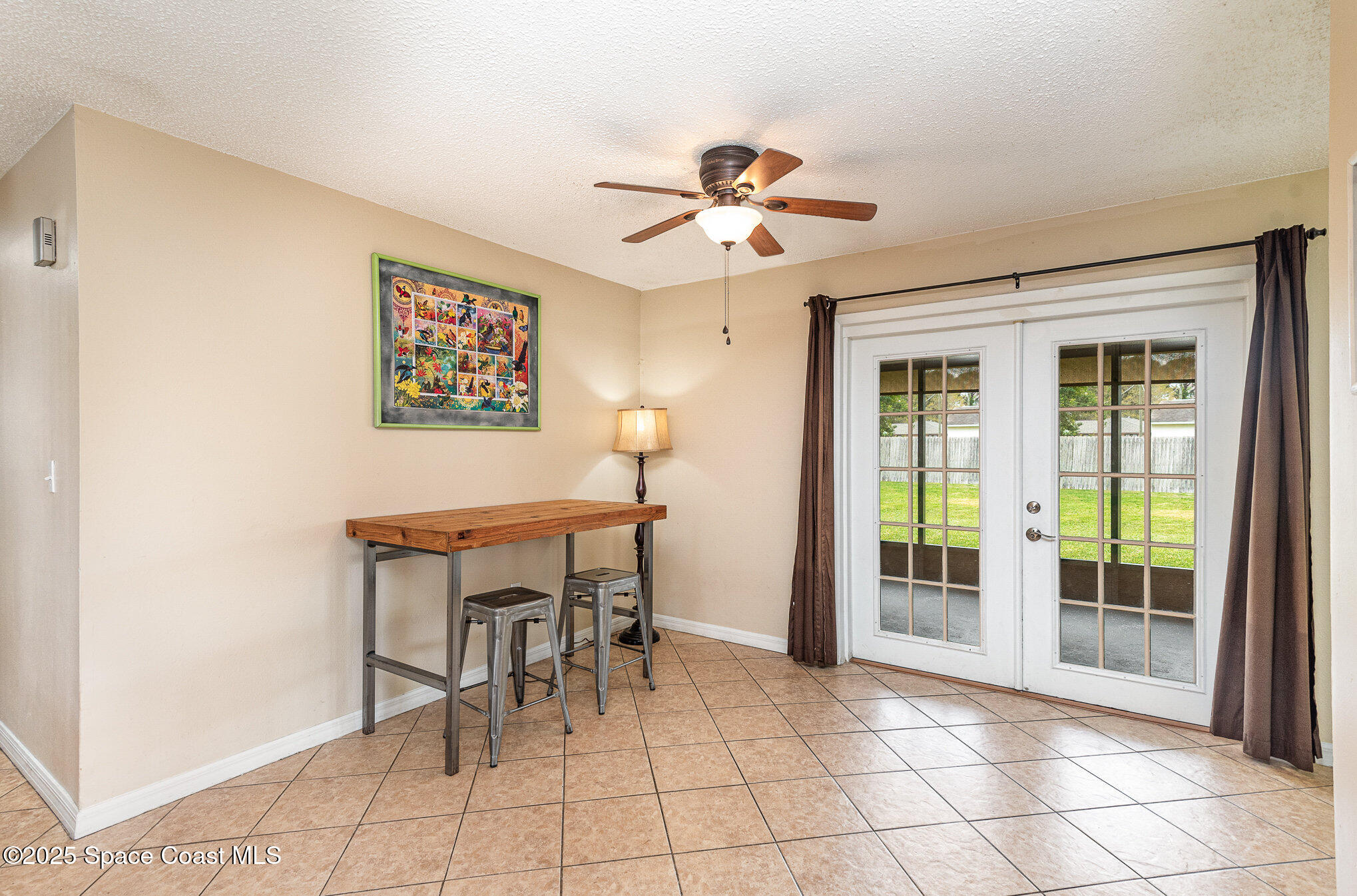 5930 Ackard Avenue Cocoa, FL 32927 - Photo 5 of 22 a view of a workspace with furniture and a window