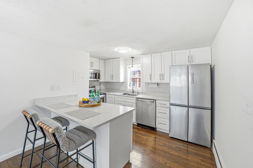 27 Arlington Road, Unit 13 Woburn, MA 01801 - Photo 3 of 20 Gallery Image 3