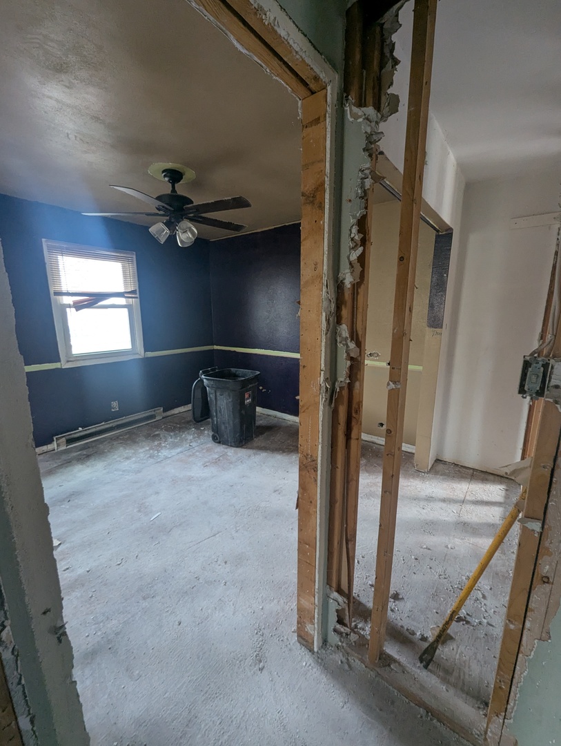 20 Academy Street German Valley, IL 61039 - Photo 3 of 9 an empty room with windows