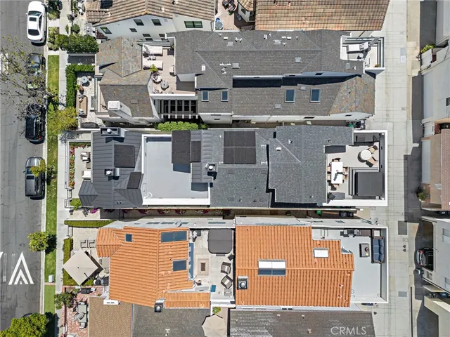 an aerial view of a city with lots of residential buildings