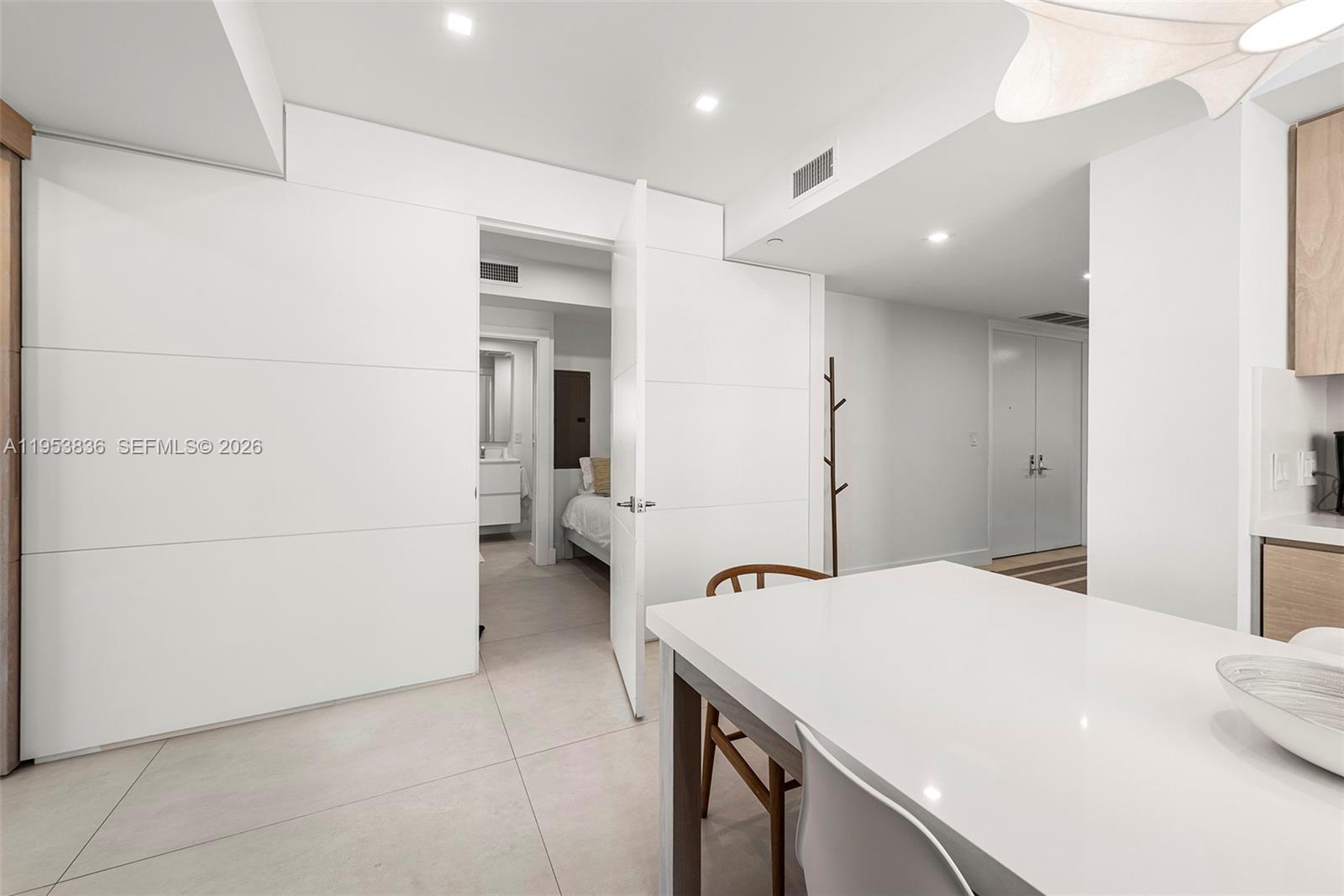 791 Crandon Boulevard, Unit 901 Key Biscayne, FL 33149 - Photo 15 of 43 a bathroom with a sink a toilet and a shower