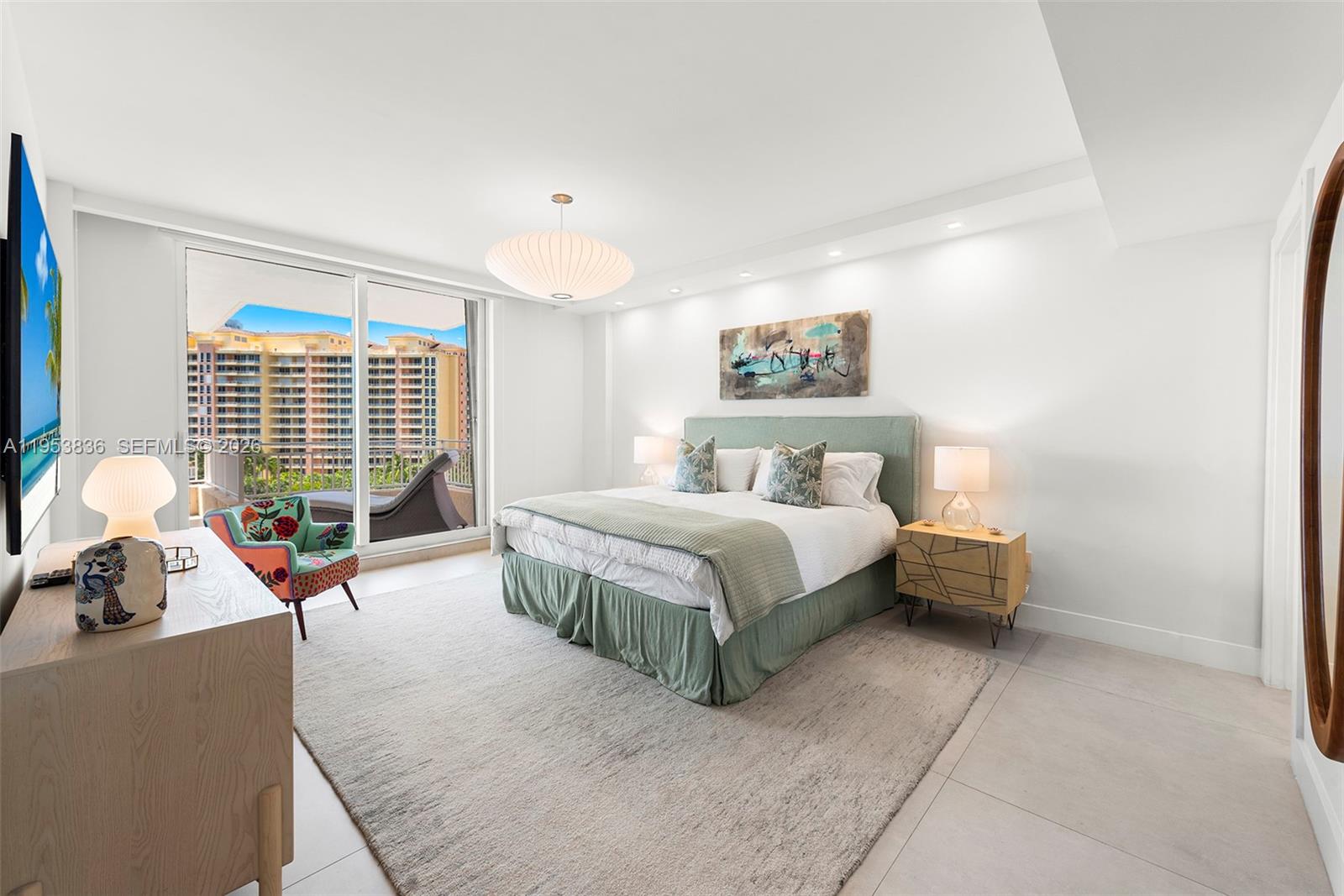 791 Crandon Boulevard, Unit 901 Key Biscayne, FL 33149 - Photo 21 of 43 a bedroom with a bed and a large window