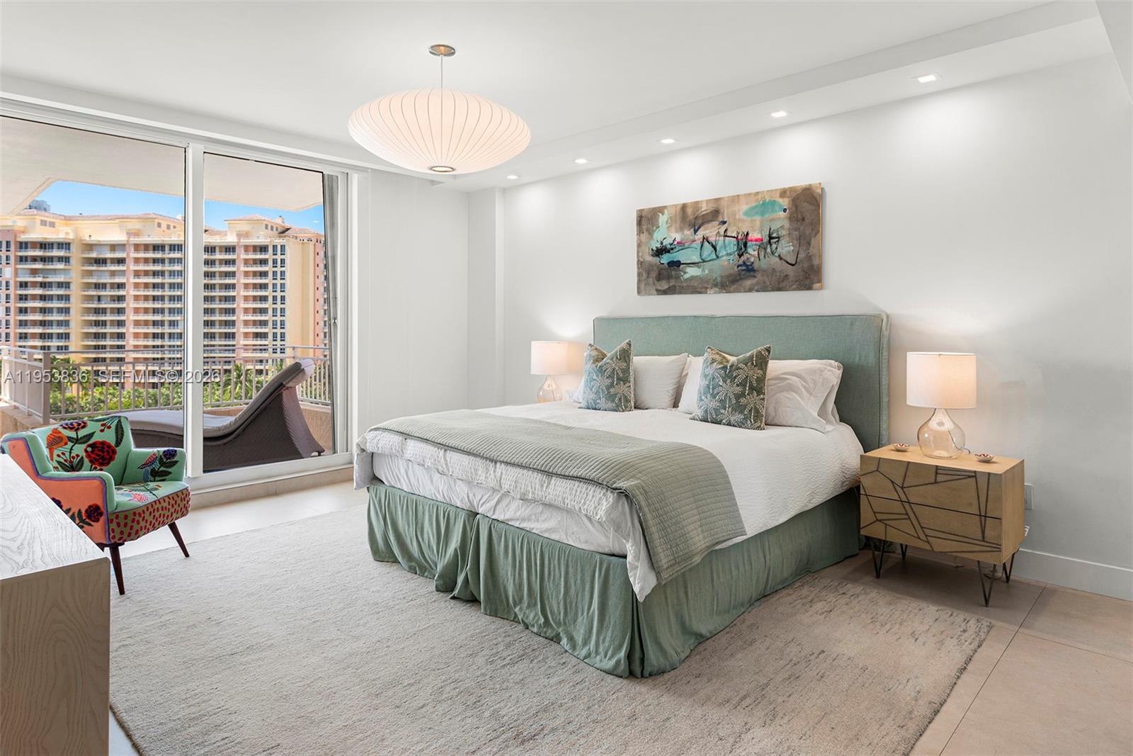 791 Crandon Boulevard, Unit 901 Key Biscayne, FL 33149 - Photo 22 of 43 a bedroom with a bed and a couch