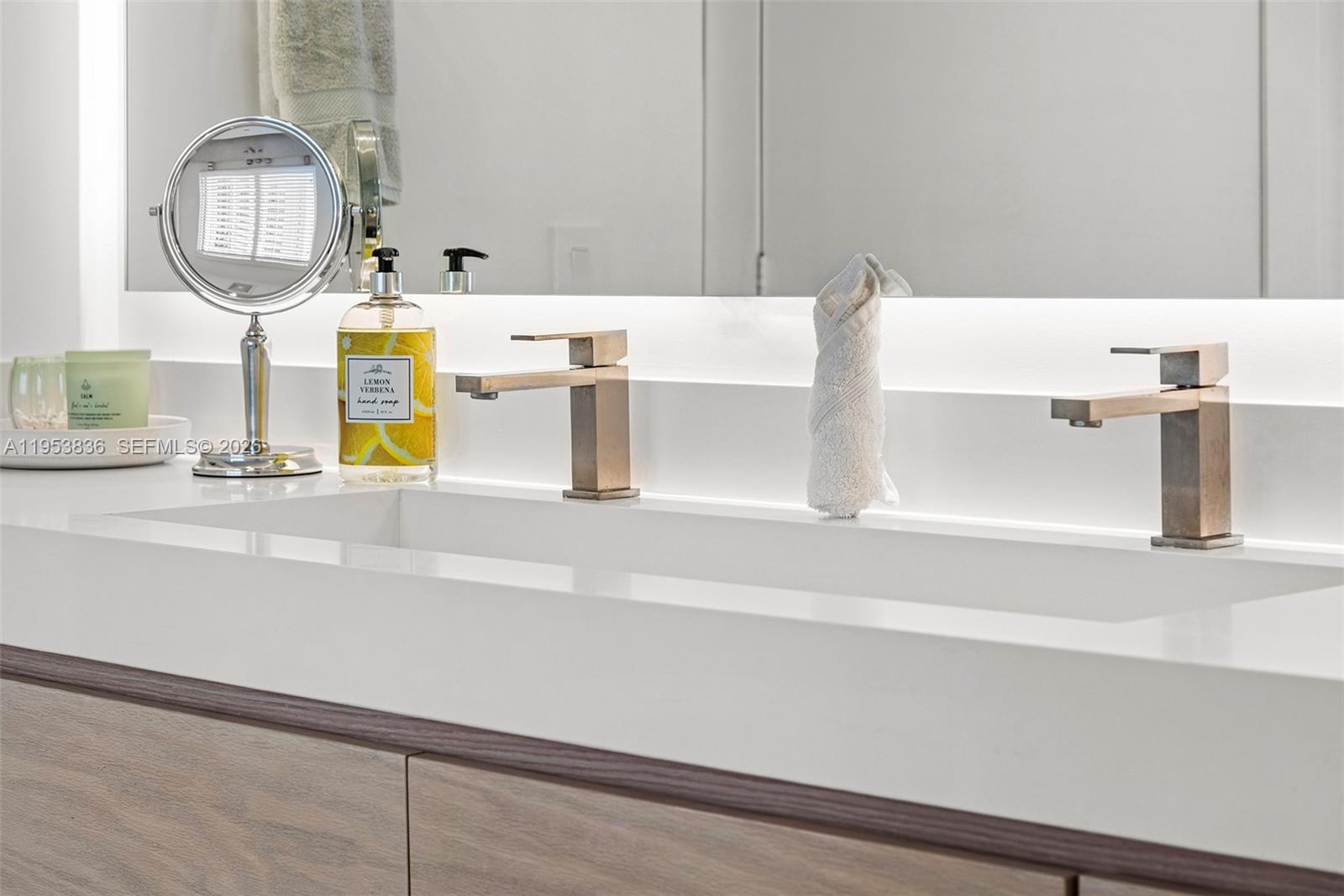 791 Crandon Boulevard, Unit 901 Key Biscayne, FL 33149 - Photo 29 of 43 a close view of sink and tap