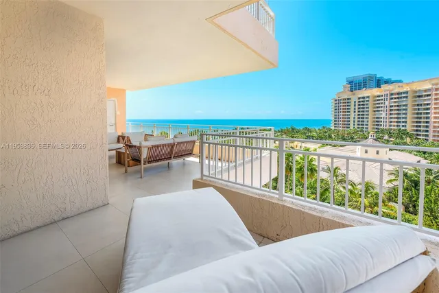 a view of balcony with furniture