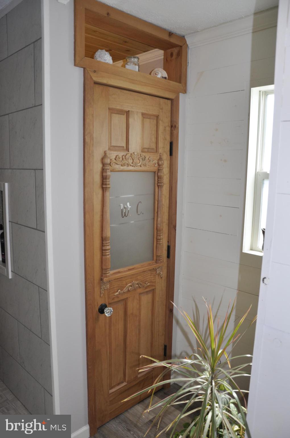380 Graham Branch Road, Unit 52389 Seaford, DE 19973 - Photo 18 of 24 Lavatory door