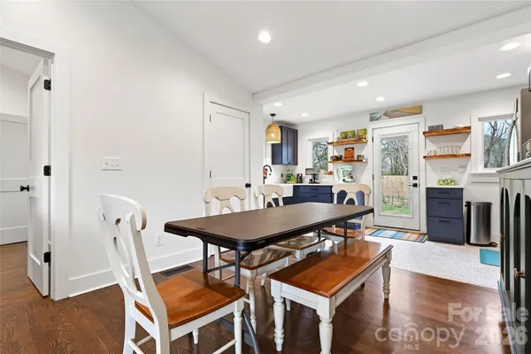 a view of a dining room with furniture