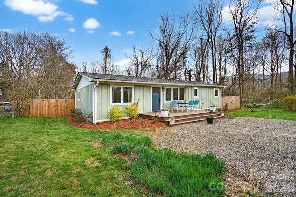 a house view with a garden space