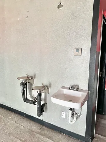 a close up of a table with chairs