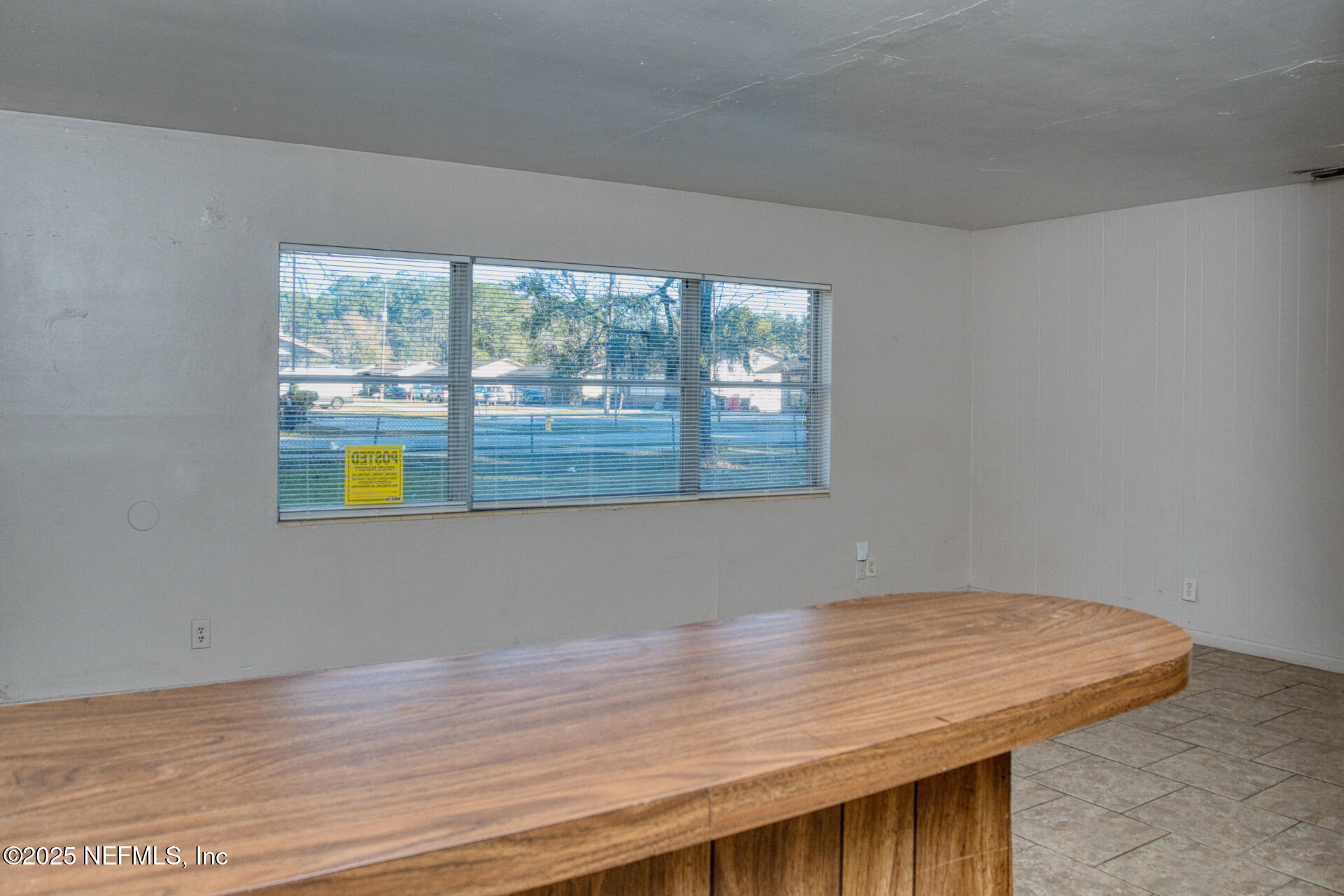 4828 Lambing Road Jacksonville, FL 32210 - Photo 15 of 31 an empty room with window