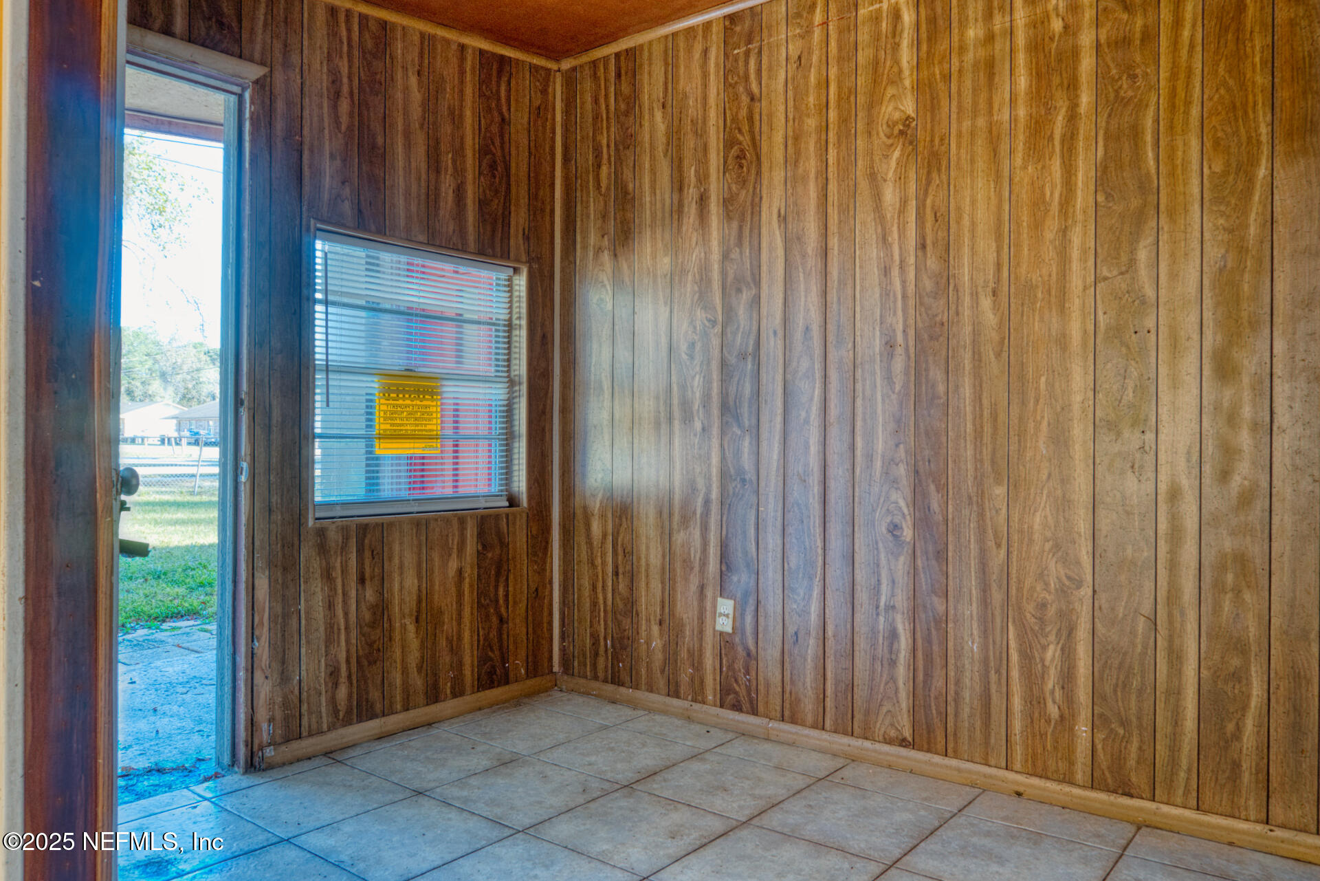 4828 Lambing Road Jacksonville, FL 32210 - Photo 5 of 31 a view of a hardwood & hallway