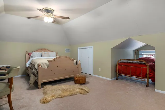 a view of balcony with wooden floor and fence