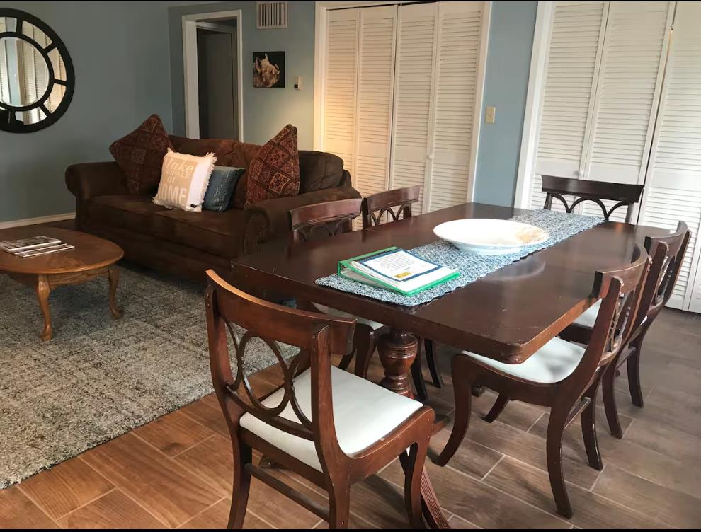 601 Bell Street Fredericksburg, TX 78624 - Photo 39 of 39 a view of a dining room with furniture and chandelier