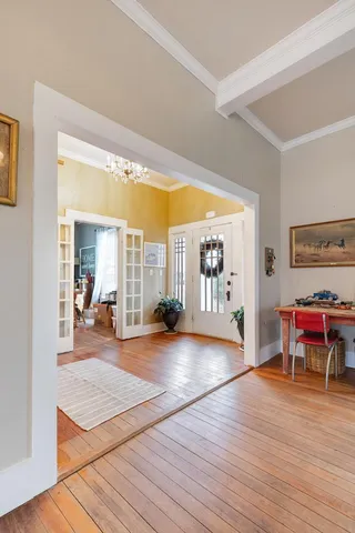 a view of a living room and dining room