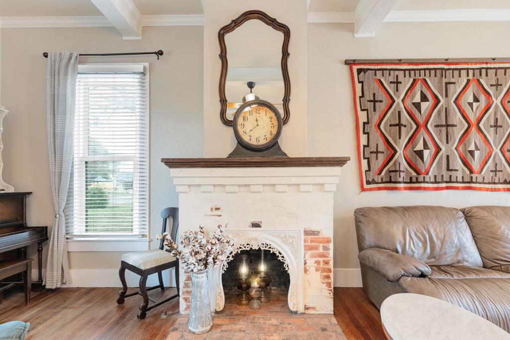 601 Bell Street Fredericksburg, TX 78624 - Photo 8 of 39 a living room with furniture and a fireplace