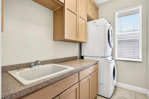 a view of a house with a tub and chairs