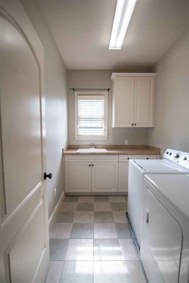 3736 Falls River Avenue Raleigh, NC 27614 - Photo 25 of 30 Conveniently located on the 2nd floor, laundry will be easy to do! Laundry Room