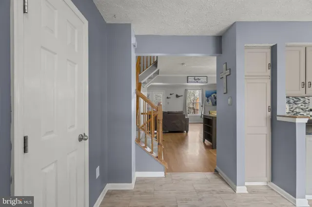 a view of a hallway with shelves