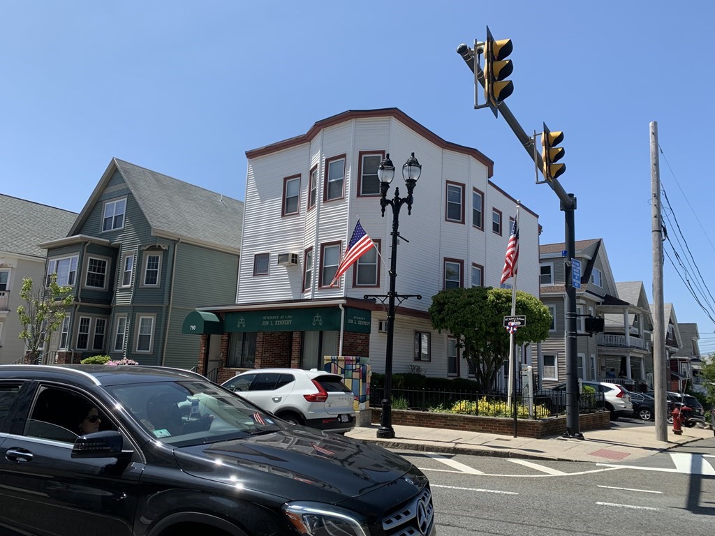 a front view of a building with street view