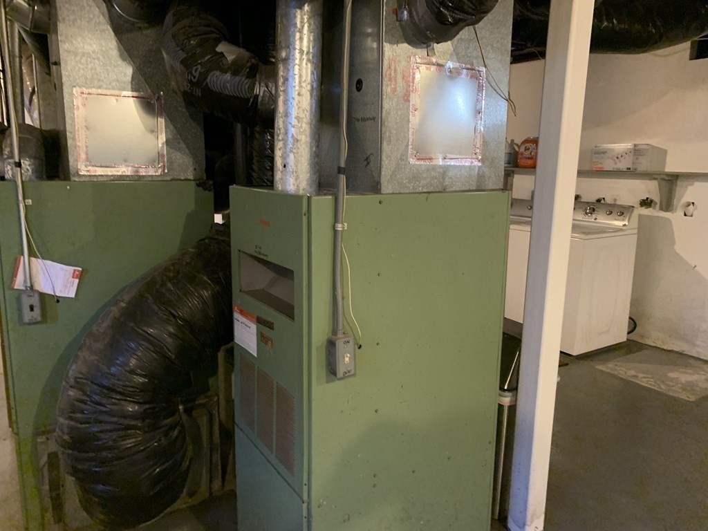 790 Broadway Everett, MA 02149 - Photo 12 of 39 a close view of water heater room