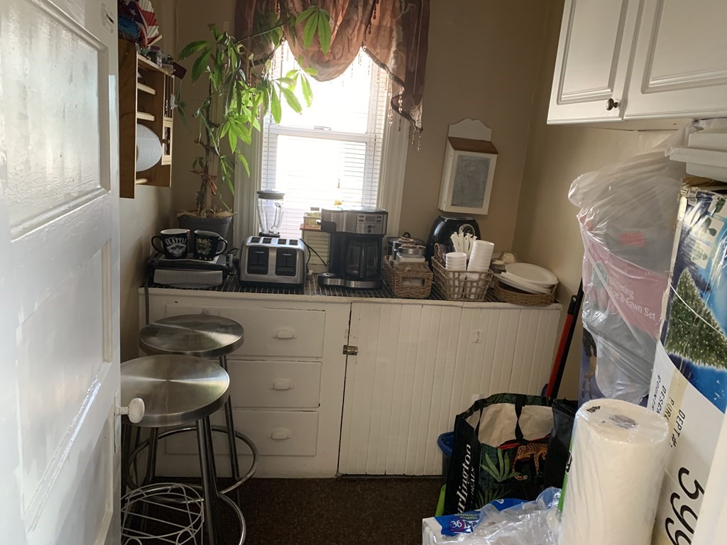 790 Broadway Everett, MA 02149 - Photo 32 of 39 a bathroom with a sink and a mirror