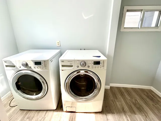 a utility room with dryer and washer