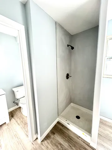 a bathroom with a sink and a shower