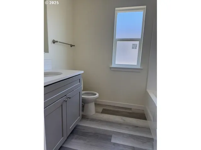 a bathroom with a toilet