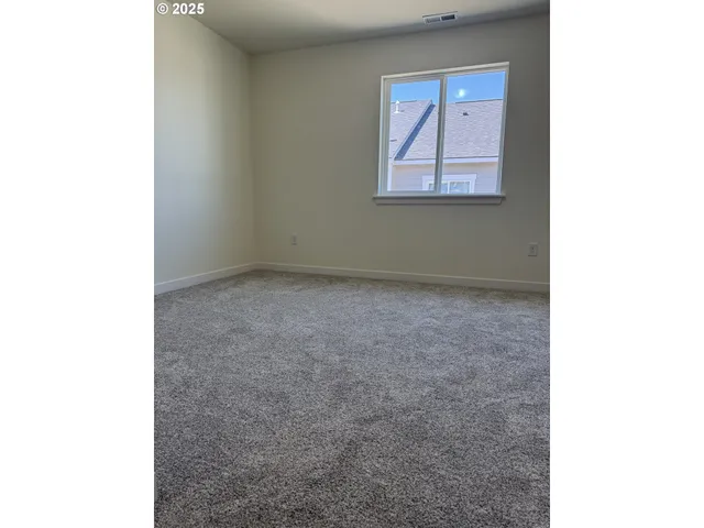 a view of an empty room with window