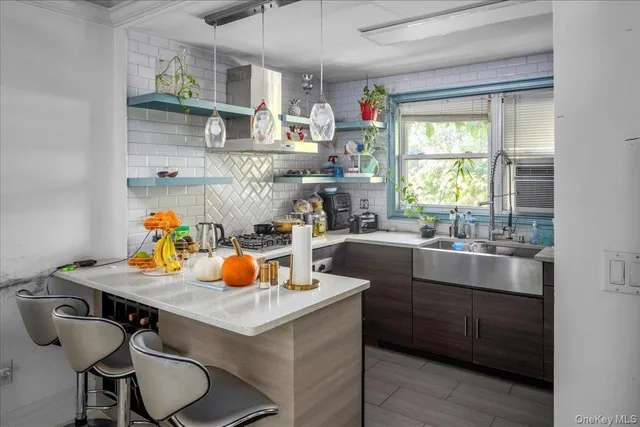 a kitchen with a table and chairs