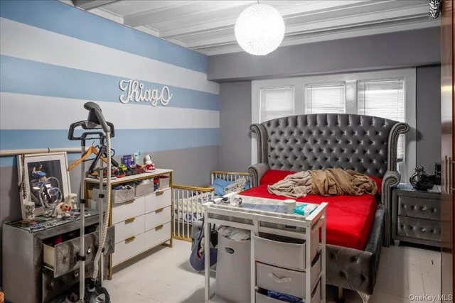 a bedroom with furniture and a closet