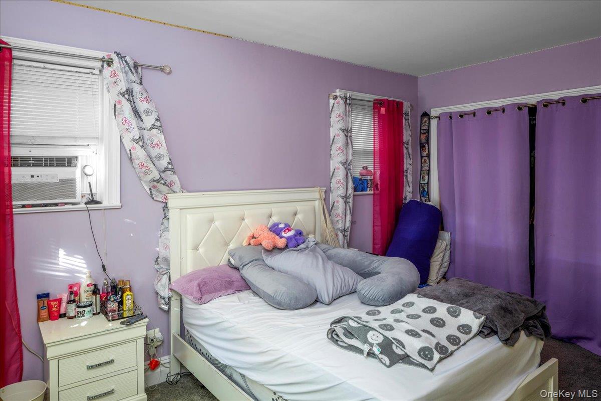 196-33 Foothill Avenue Queens, NY 11423 - Photo 15 of 34 a bedroom with furniture and a closet