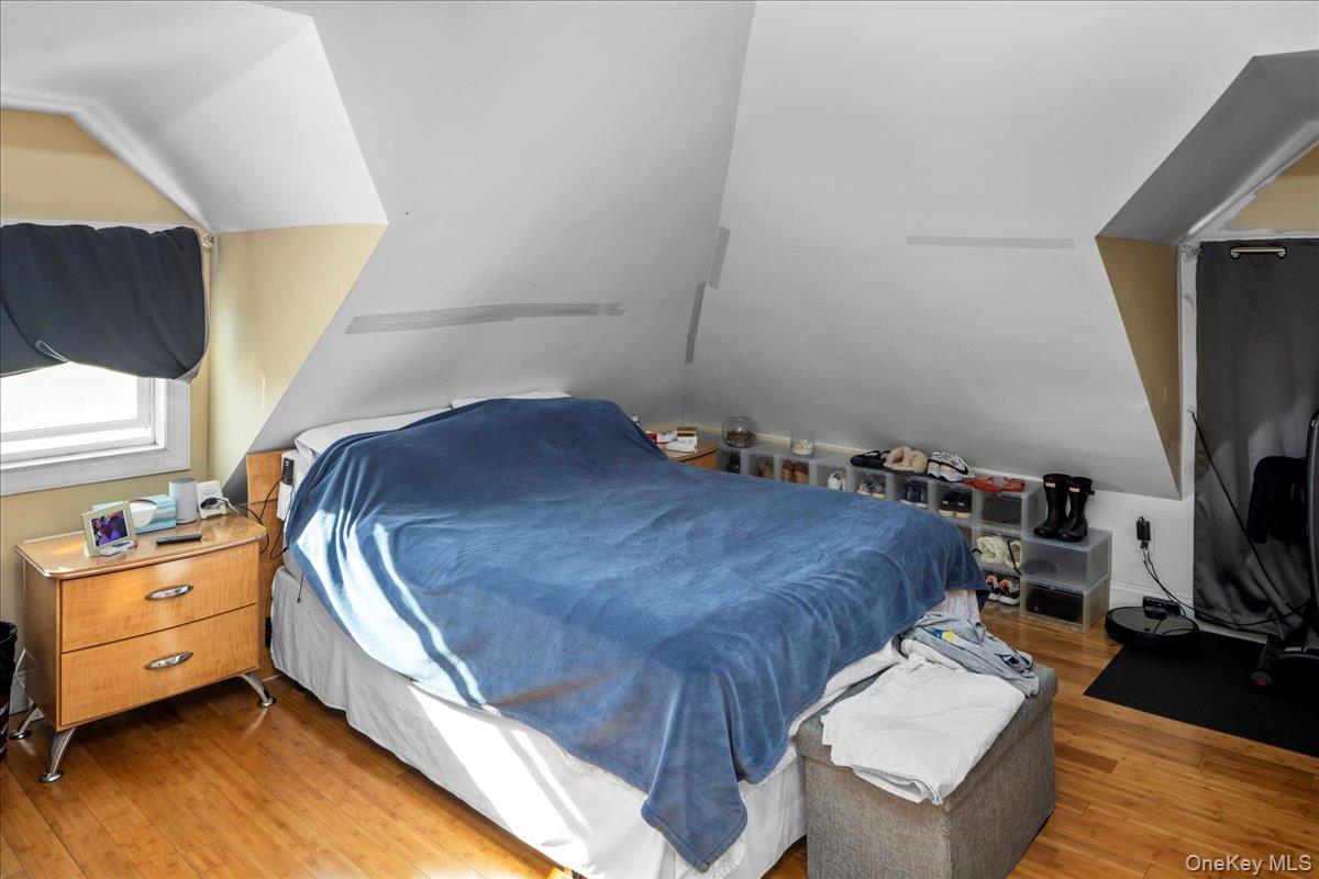 196-33 Foothill Avenue Queens, NY 11423 - Photo 21 of 34 a bed room with a bed and a television