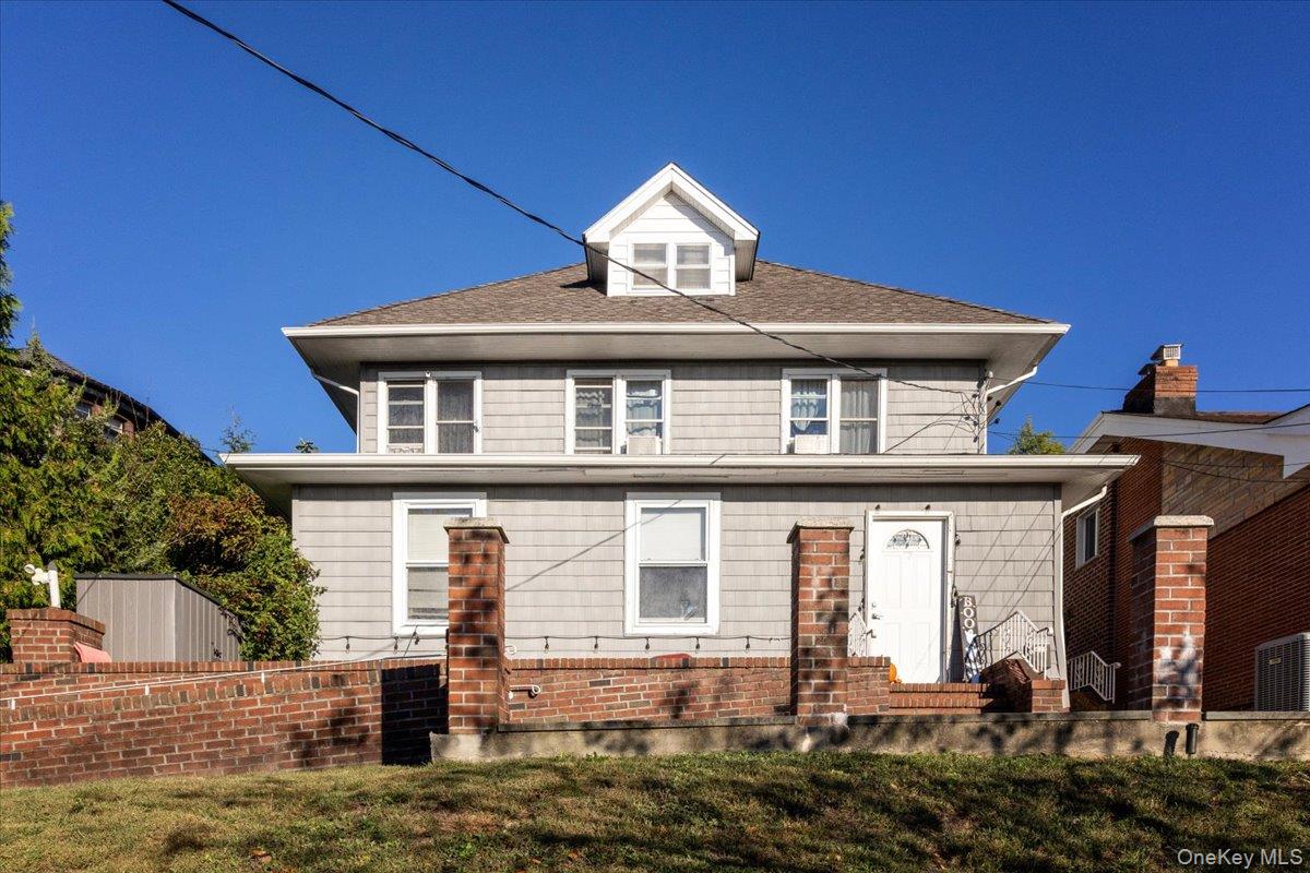 196-33 Foothill Avenue Queens, NY 11423 - Photo 5 of 34 a front view of a house with garden
