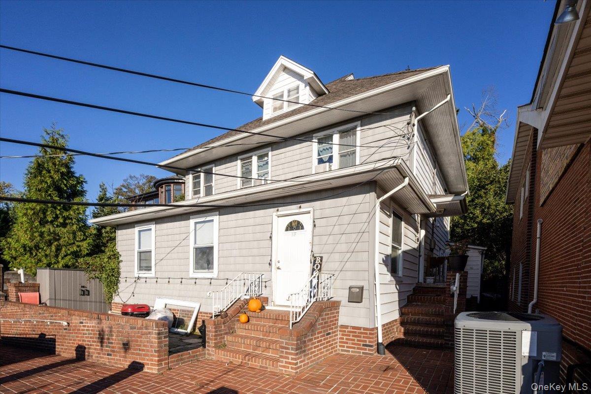 196-33 Foothill Avenue Queens, NY 11423 - Photo 6 of 34 a front view of a house with outdoor space