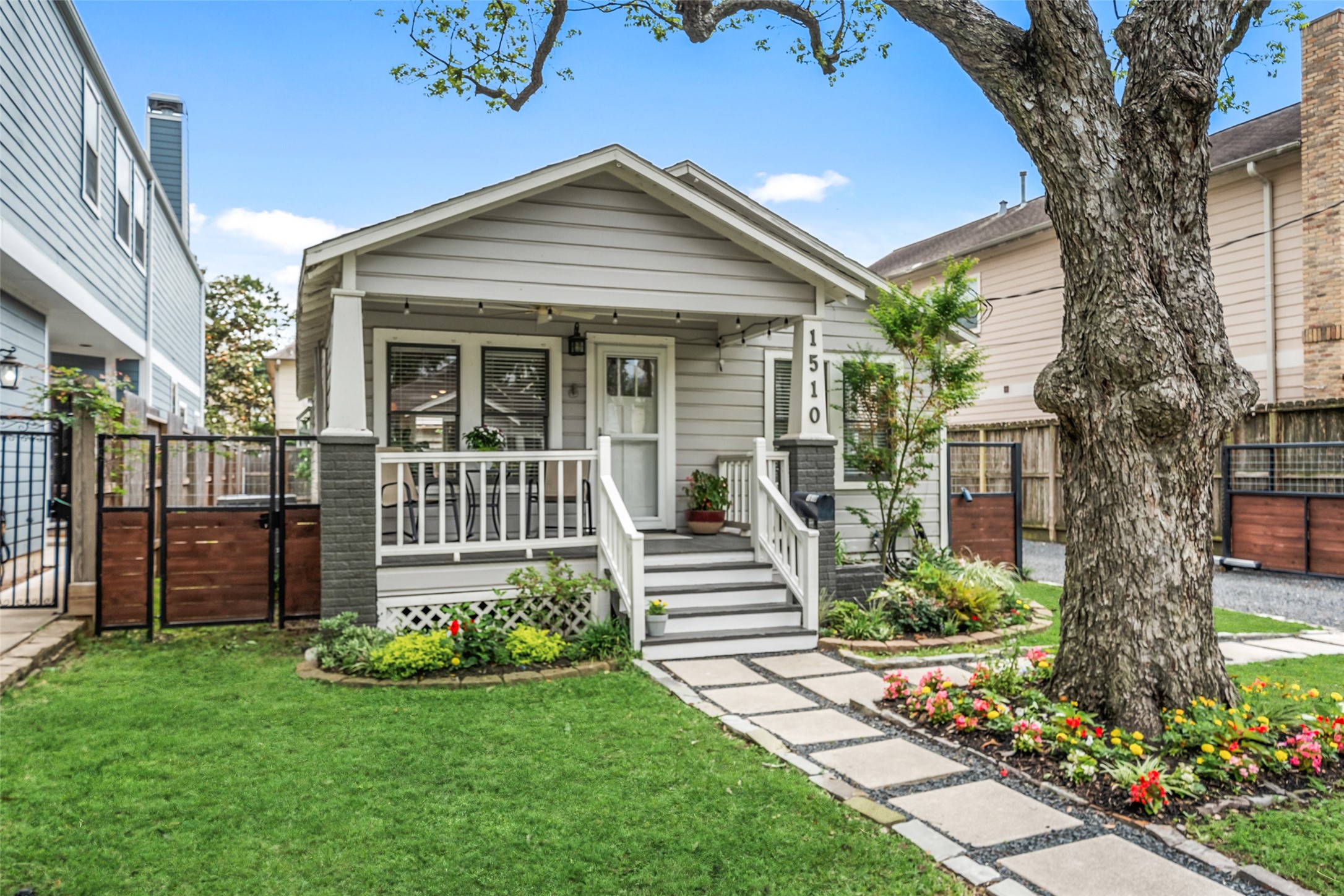 front view of a house with a yard
