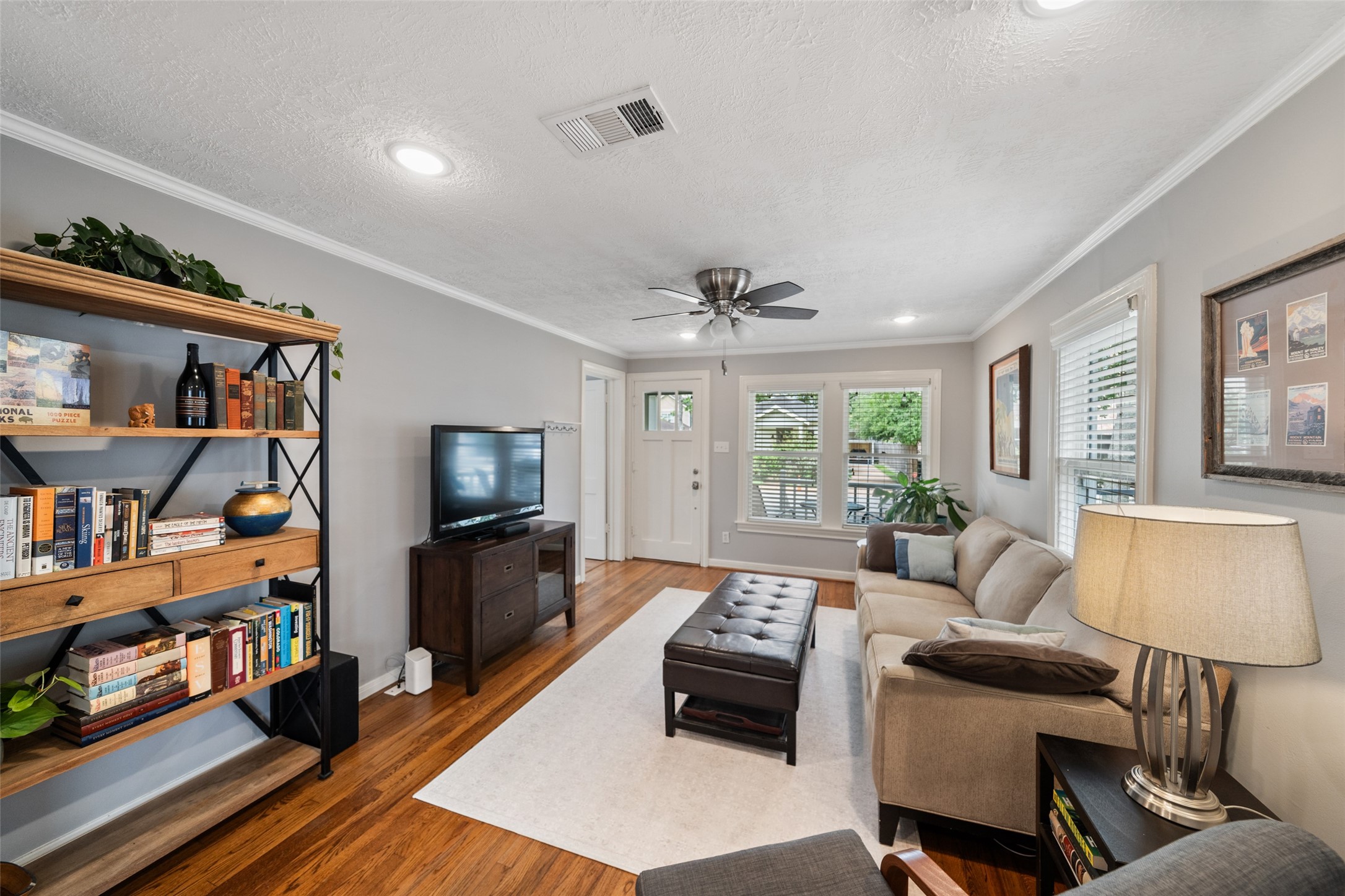 1510 Alexander Street Houston, TX 77008 - Photo 13 of 18 Step inside to hardwood floors, natural light, and a layout that flows front to back without a wasted inch. Classic Heights Craftsman logic.