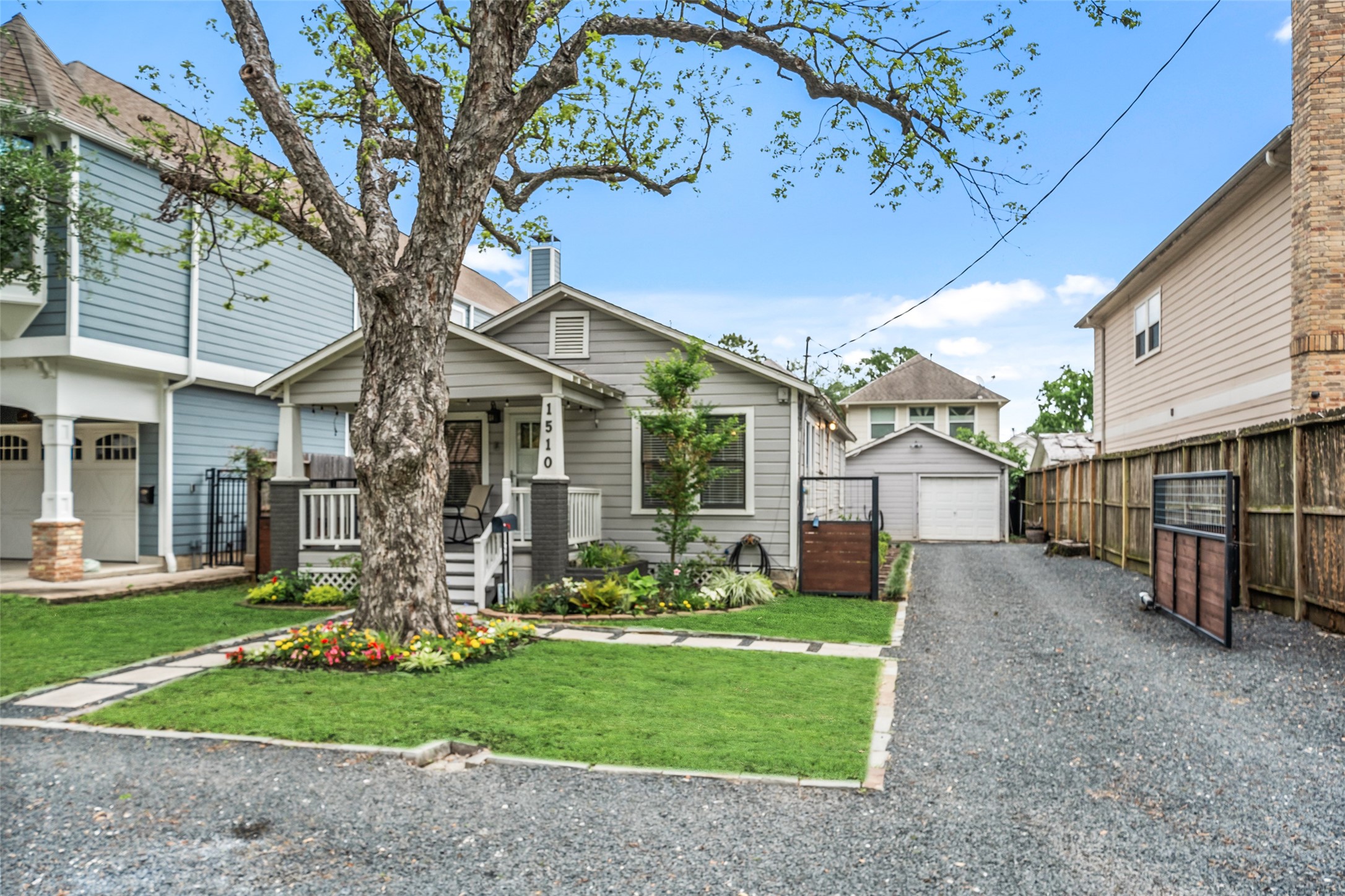 1510 Alexander Street Houston, TX 77008 - Photo 17 of 18 Deep gated driveway with room for multiple cars, plus front street parking — serious parking for the Heights at any price point.