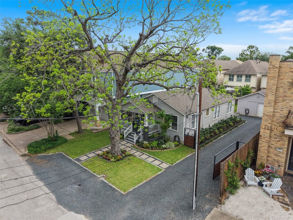 1510 Alexander Street Houston, TX 77008 - Photo 2 of 18 The full picture from above — a generous Heights lot with deep gated driveway, detached garage, fully fenced backyard, and a front porch worth coming home to.”