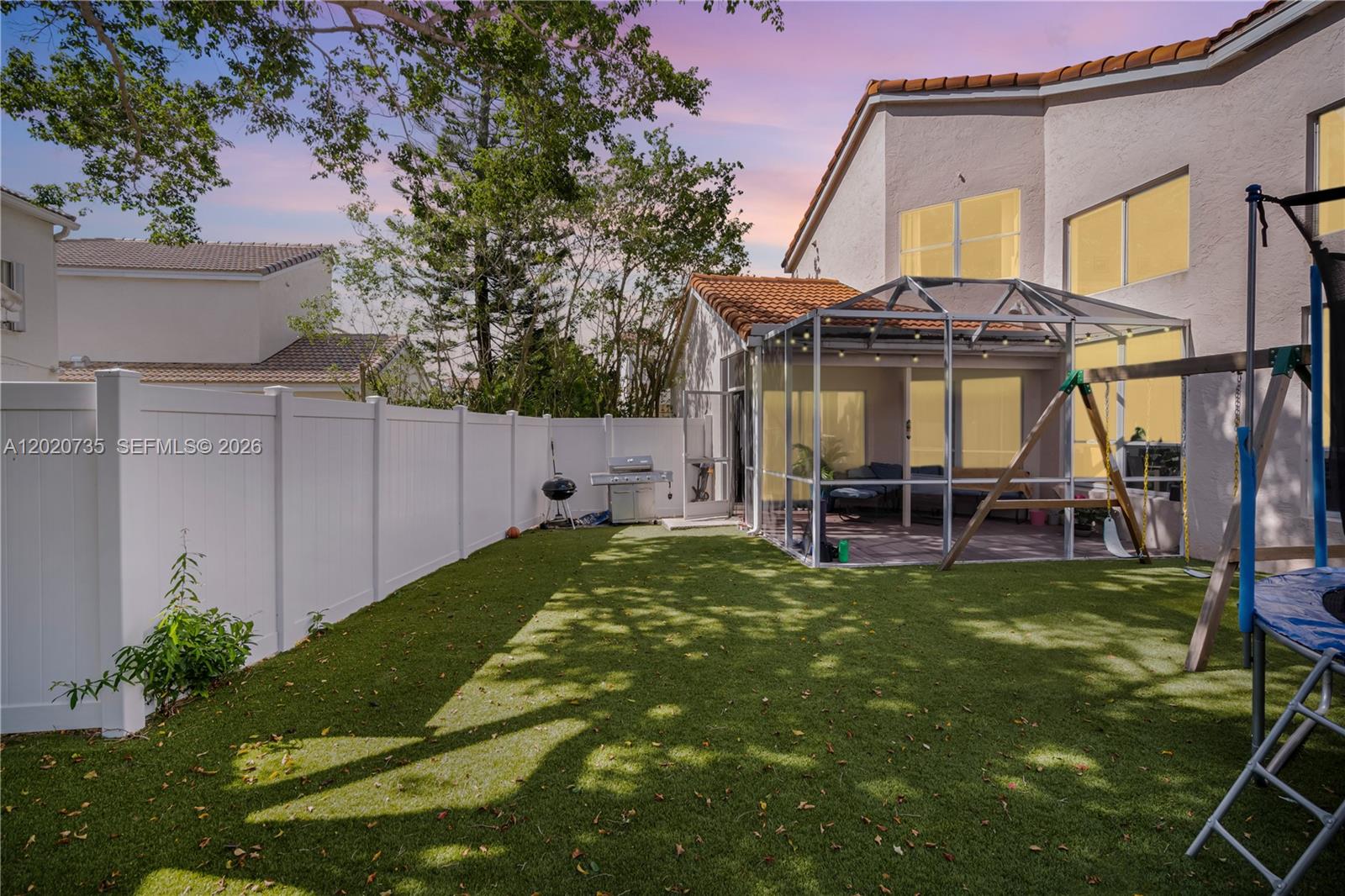 17244 Balboa Point Way Boca Raton, FL 33487 - Photo 45 of 66 a view of a house with backyard and sitting area