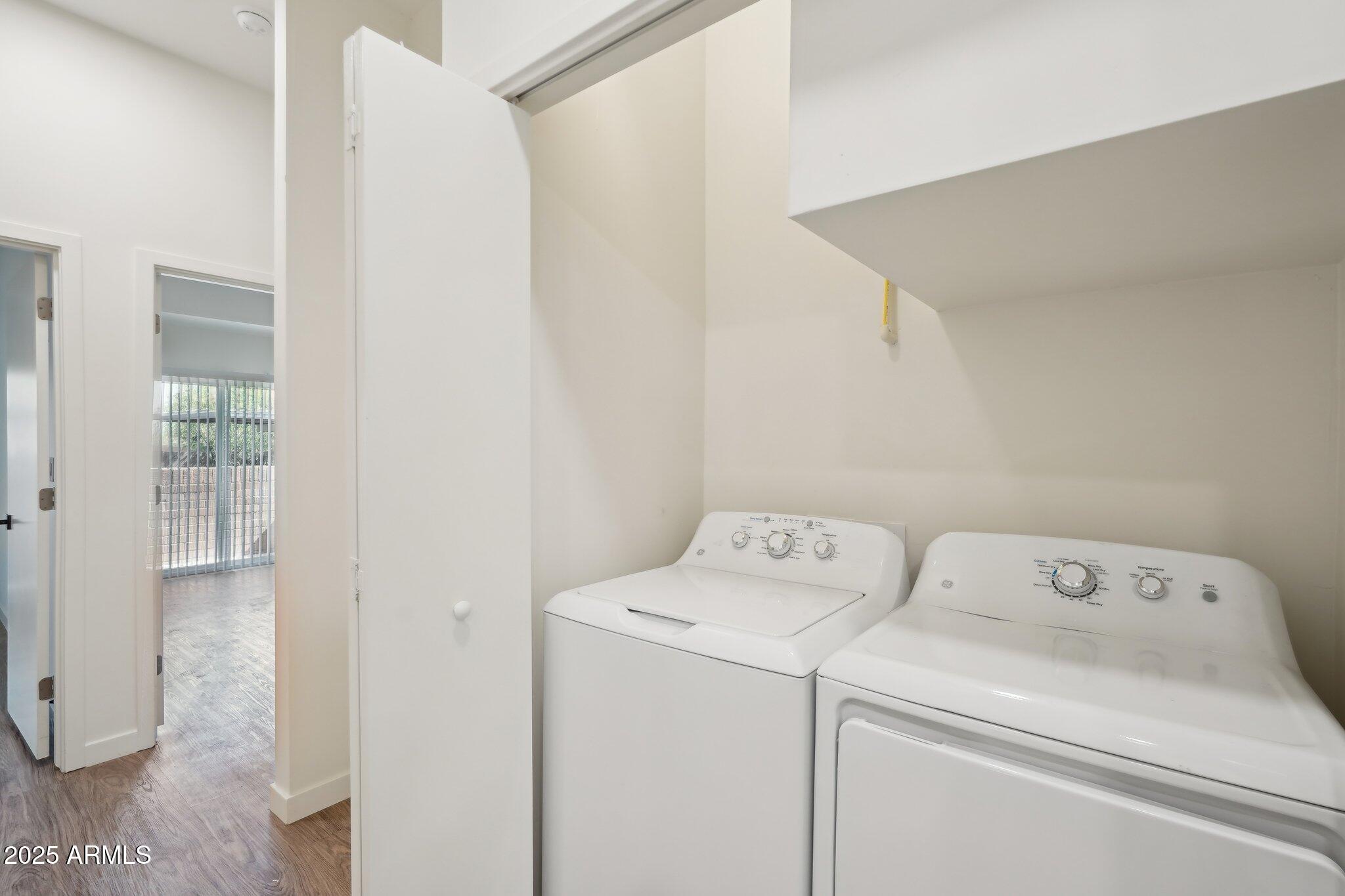 3031 West Northern Avenue, Unit 108 Phoenix, AZ 85051 - Photo 14 of 18 a utility room with dryer and washer