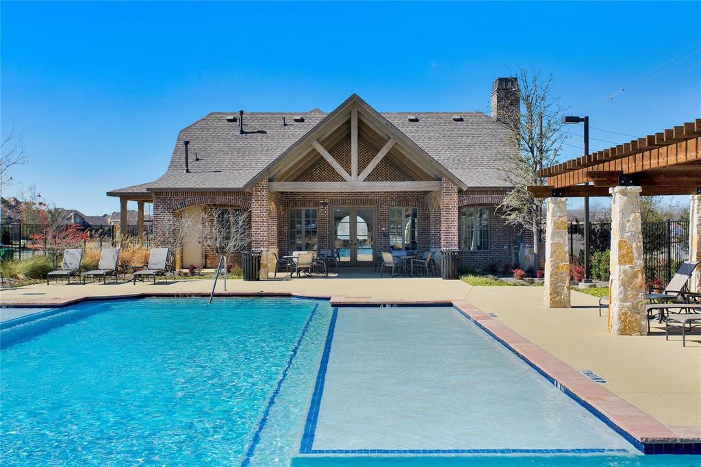 4642 Rhett Lane, Unit B Carrollton, TX 75010 - Photo 26 of 26 Community pool featuring a patio and french doors
