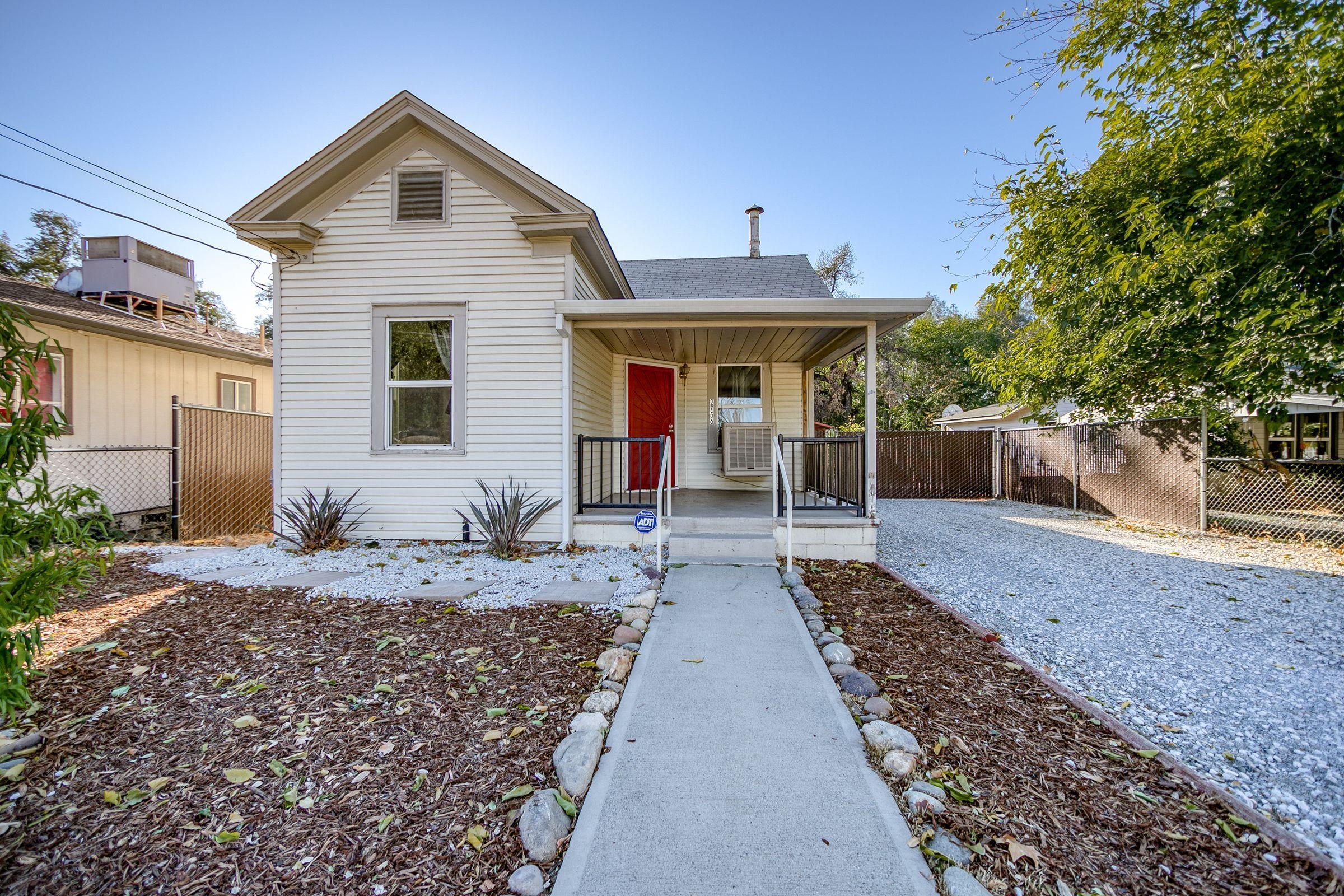a front view of a house with a porch