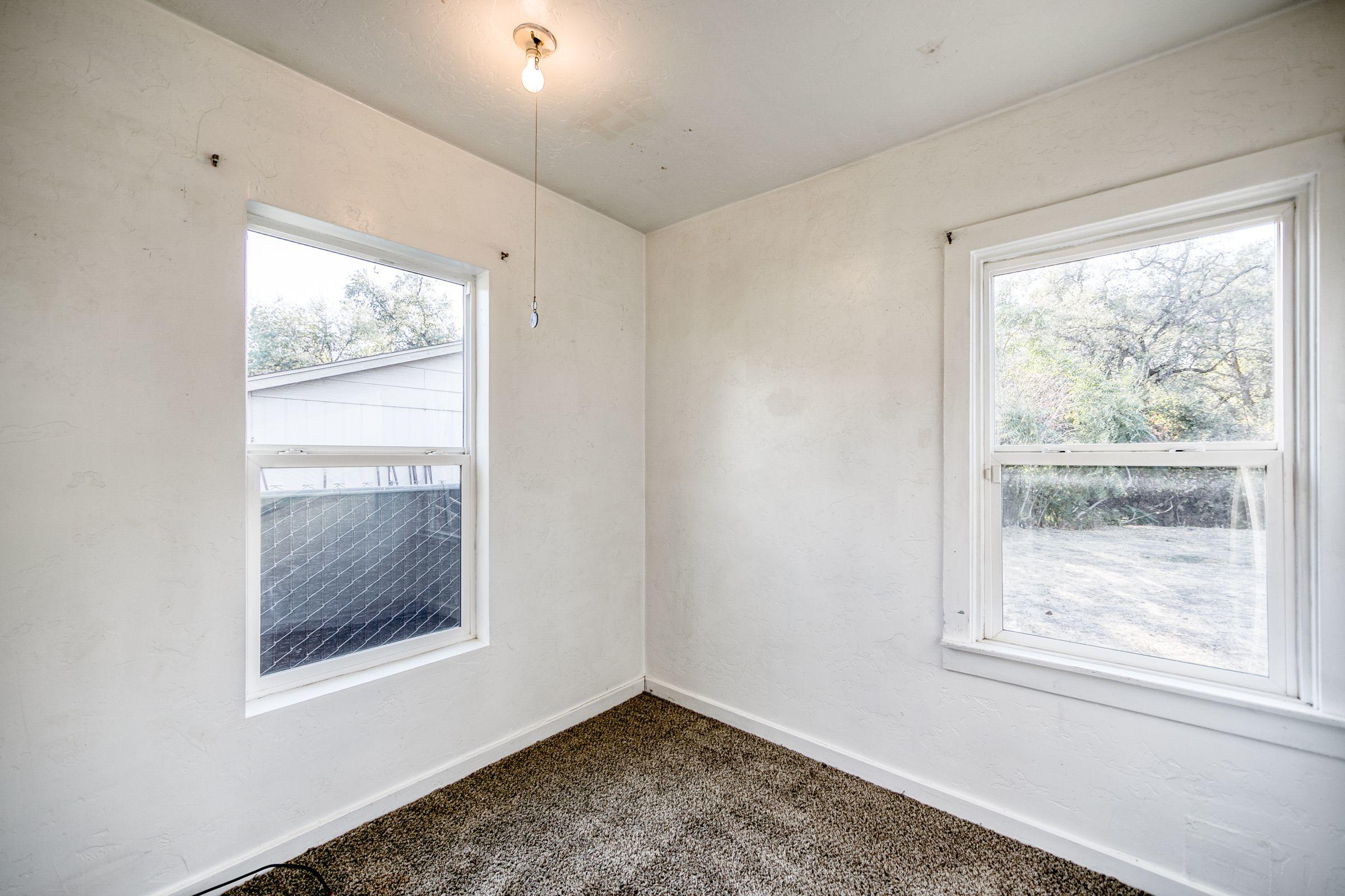 2756 Henderson Road Redding, CA 96002 - Photo 7 of 13 a view of an empty room with window